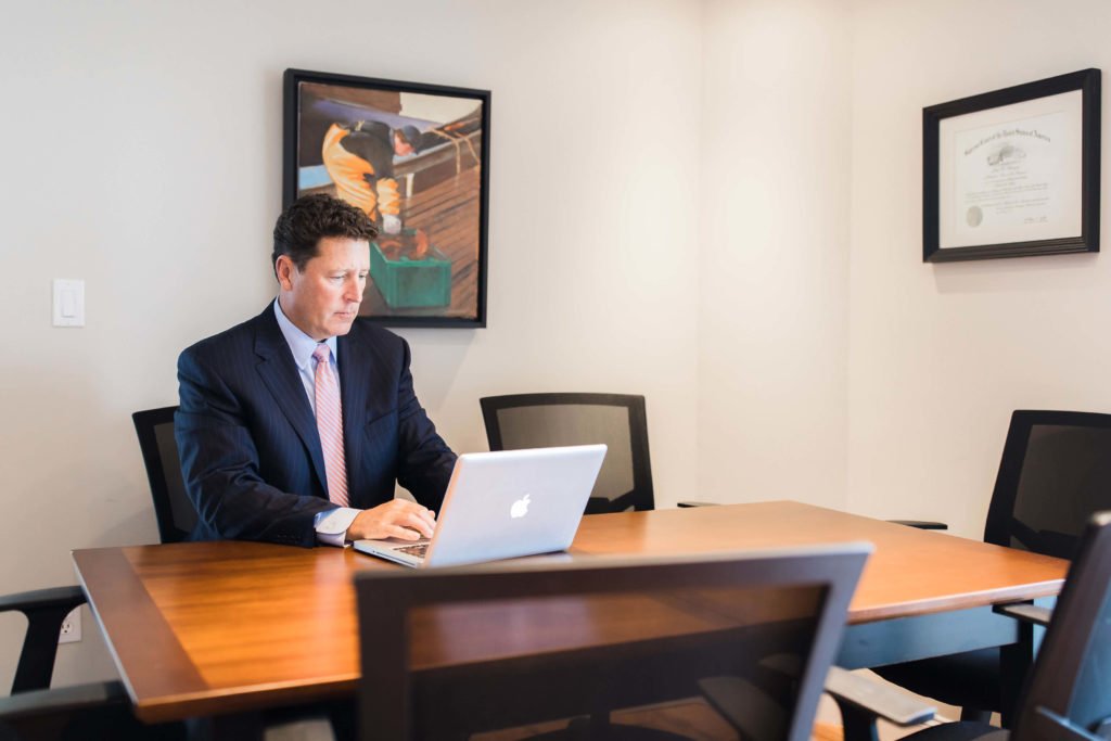 John Sherman in his Office Working